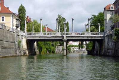 Cobbler's Bridge dates to 13th Century (current bridge constructed in 1931) on the Ljubljanica River, Slovenia