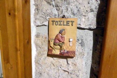 Toilet sign at restaurant in Cilipi, Croatia