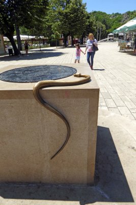 Snake on the Well in Dvorski square in Cetinje, Montenegro