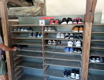 Taking off shoes before entering Ninomaru Palace