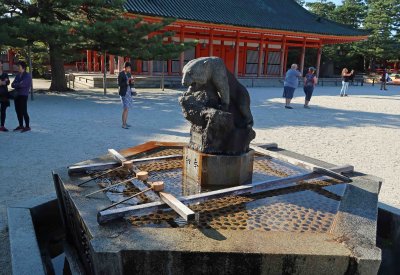A purification basin inside the gate of Heian Shrine