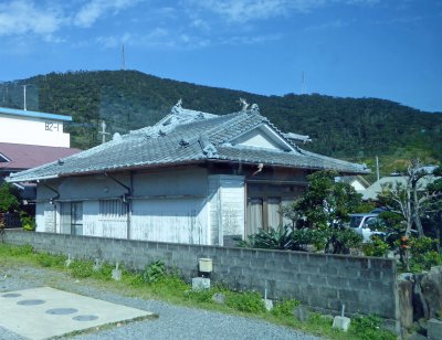 House with traditional Japanese roof on Amami Island, Japan