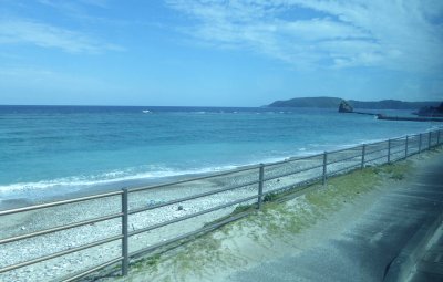 Driving along the East China Sea on the coast of Amami Island