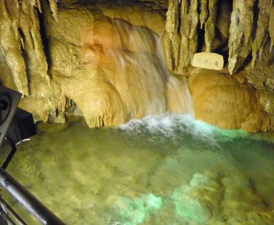 An underground river supplies this waterfall in Gyokusendo Cave