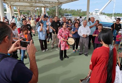 Prayer ceremony send-off for group who were visiting Taketomi Island