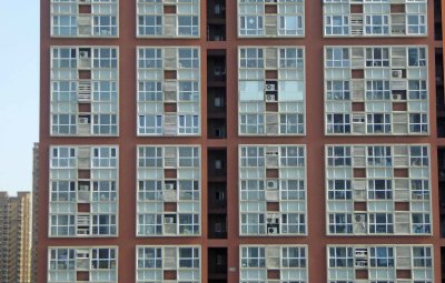 Most apartments in China have central heat, but window air conditioners