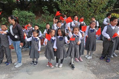 Young kids at the Mingxing School in Dalian, China
