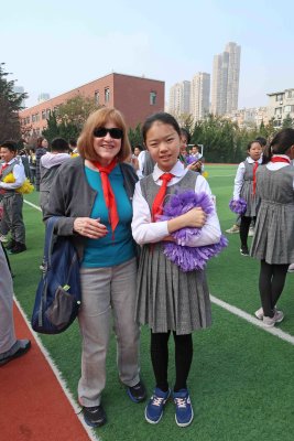Susan with tall student at Mingxing School