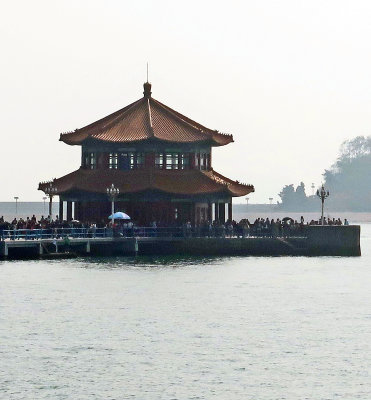 The Chinese style Pagoda, called 'Huilan' on Zhaoqiao Pier is featured as the logo of Tsingtao Beer