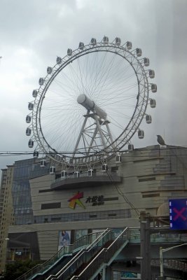 The Sky Wheel is mounted on top of the Joy Shopping Centre in Shanghai