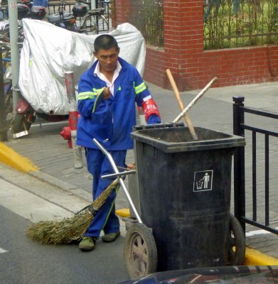Interesting broom for street cleaner in Shanghai