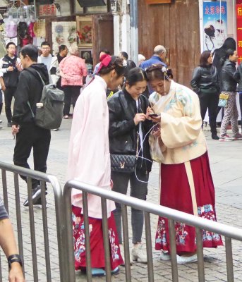 Girls in traditional dress in Suzhou, China