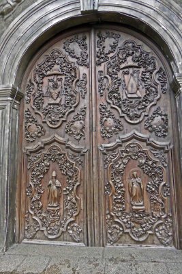 Carved wooden doors on San Augustin Church