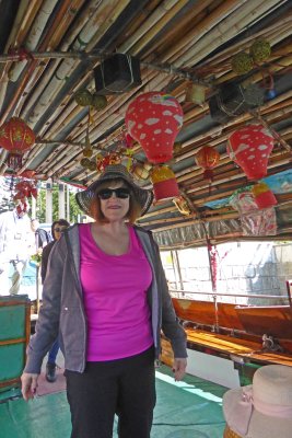 Susan aboard a Sampan in Aberdeen Harbor