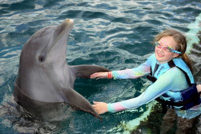 Maddie with Katie the dolphin