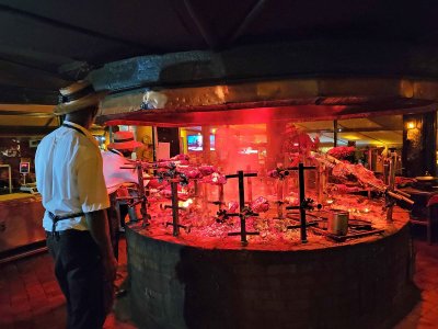 Meat is skewered on Maasai swords and cooked on coals at the Carnivore Restaurant