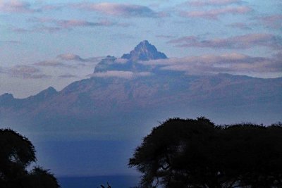 Mawenzi Peak (16,893 ft) of Mount Kilimanjaro starting to emerge