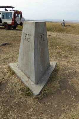 Kenya-Tanzania border marker in the middle of the Maasai Mara