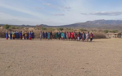 Maasai village residents waiting to welcome us