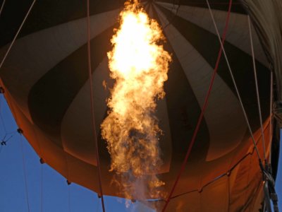 Heating the air inside the balloon to change altitude