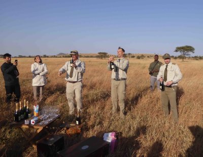 Balloon pilots making champagne toast