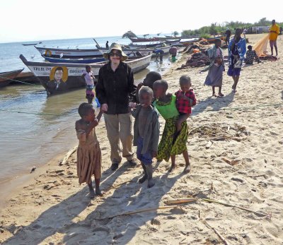 Susan with some of the village kids on Lake Victoria