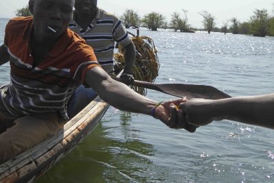 Passing lollipops to the other canoe