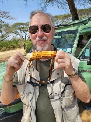George bought Bill an ear of roasted corn