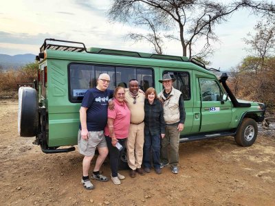 Ron, Carol, Susan, & Bill on the last morning with our Tanzanian driver (Leo)