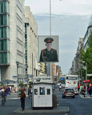 Photo of Russian Soldier looking west from Checkpoint Charlie in Berlin