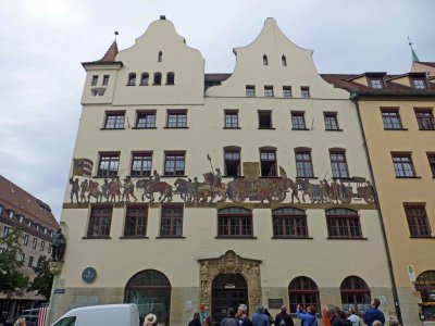A medieval Nuremberg merchant's procession is depicted on this building that was originally the Nuremberg Stock Exchange