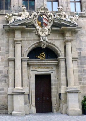 Nuremberg city coat of arms over an entrance to the City Hall