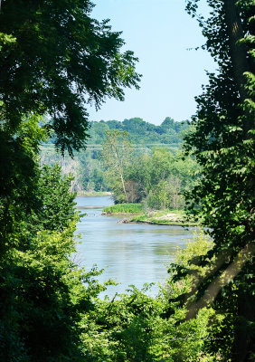 While hiking in Fontenelle Forest I caught a small view of the Missouri River. As I zoomed in I found I had also caught a Bald Eagle setting on a tree branch across the river. To find the eagle zoom in on the right side of the photo and look through the trees.

An image may be purchased at http://fineartamerica.com/featured/missouri-river-glimpse-edward-peterson.html?newartwork=true