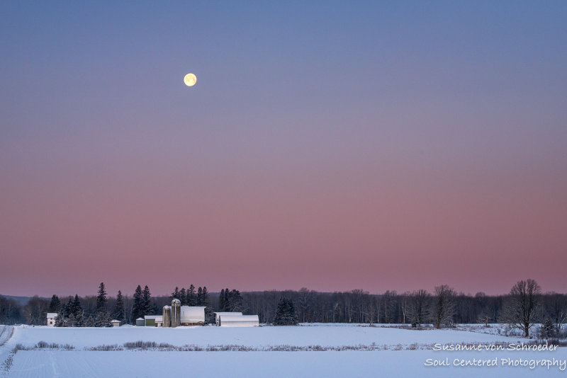 Snow Moon setting in rural Wisconsin