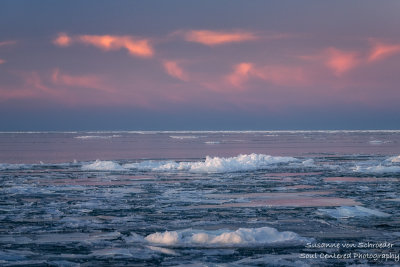 Pink and blue sky with floating Lake Superior ice