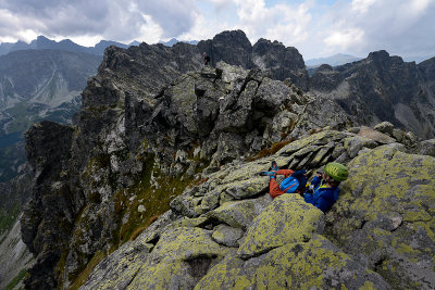 Alex relaxing on Zadni Granat Peak 2240m, behind Kozi Peak 2291m, Tatra NP