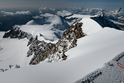 Looking along the descend route from Lyskamm West summit 4481m down Zwilling glacier to Punta Felik 4087m