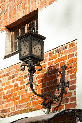 Lantern On A Brick Wall