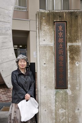 m in front of her high school