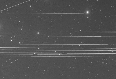 Geostationary Satellite Trails With an asteroid