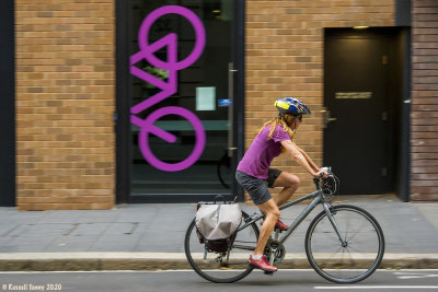 Magenta Cyclist in Sydney CBD