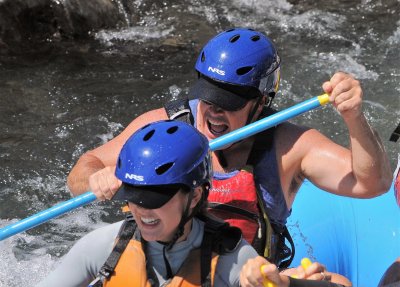 A Father and His Daughter Sharing White Water 