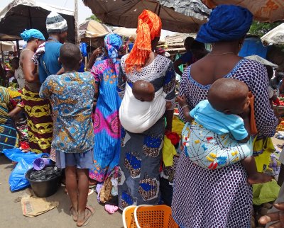 Babies are carried on their mothers' backs...and seldom cry.