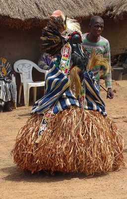 Another mask dancer (and his minder)