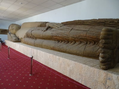 A very large, wooden, reclining Buddha