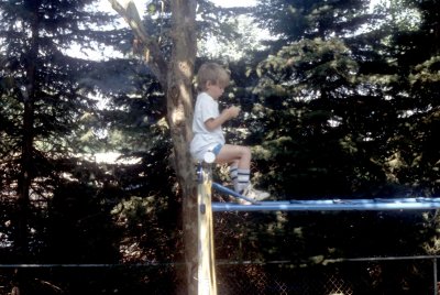 01 Dylan on jungle gym with game 01.jpg