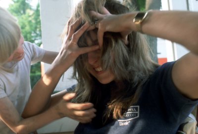 10 Keith messing Tory's hair.jpg