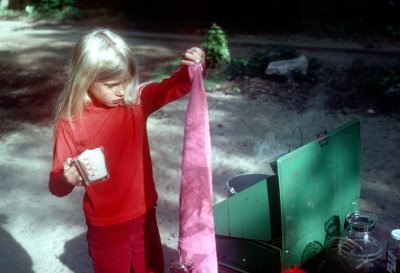 06 Erica looking at rag while holding flour for pancakes.jpg