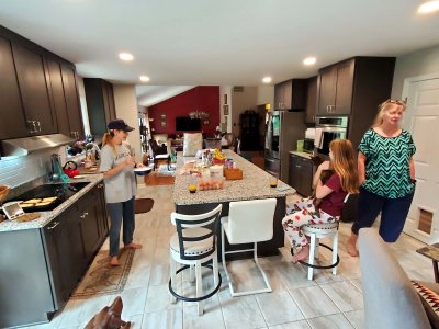 03 Erica, Bailey, and Tory in the new kitchen.jpg