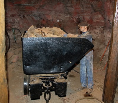 Filling a buggy with iron ore